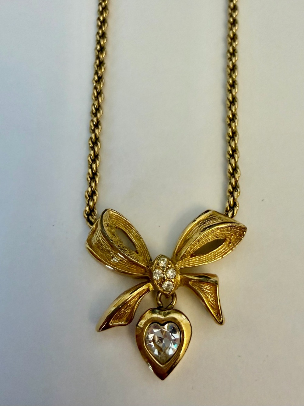 Authentic Christian Dior Gold Bow Pendant Necklace with Heart Crystal